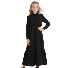 Young girl wearing a black dress on a white background