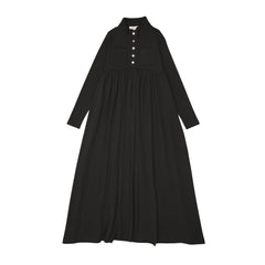 Black dress with long sleeves on a white background