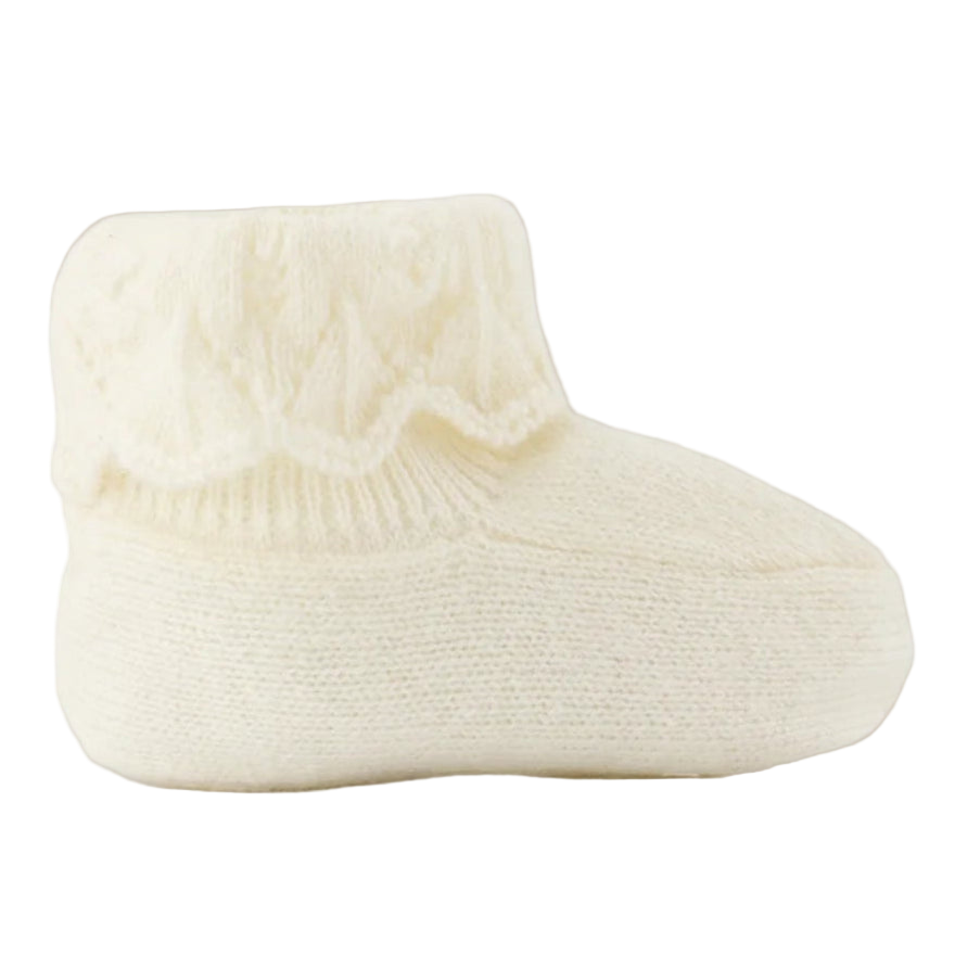 White baby bootie on a white background