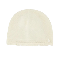 White knit beanie on a white background