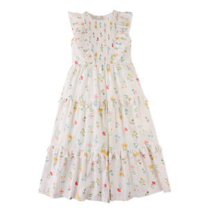 White dress with colorful floral pattern on a white background