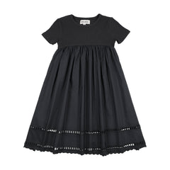 Black dress with lace trim on a white background