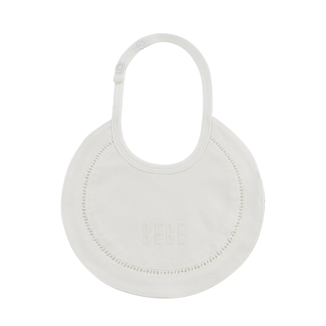 The Kipp Baby – White Bebe Bib is a charming everyday essential designed