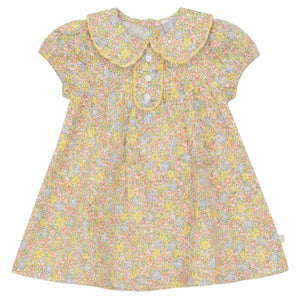 Floral dress with a yellow collar on a white background