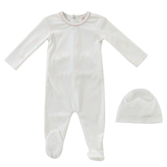 Baby onesie and hat set on a white background