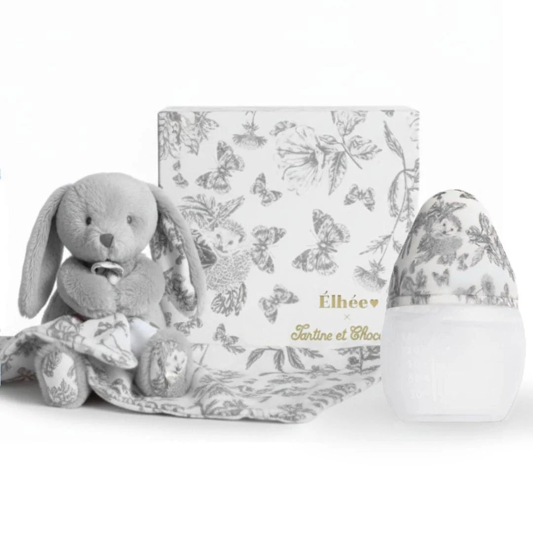 Gray plush bunny toy with a matching blanket and decorative egg on a white background