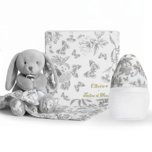 Gray plush bunny toy with a matching blanket and decorative egg on a white background
