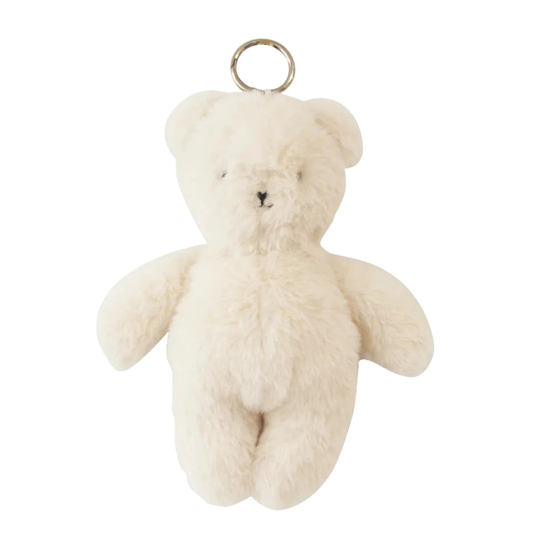 The Alimrose Mini Bear Bag Charm featuring ivory faux fur.