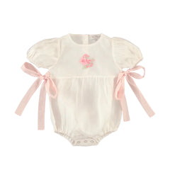 A front view of the soft rose-colored Bebe Organic Fairy romper for babies.
