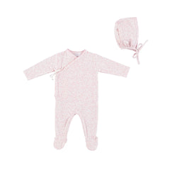 A front view of the Bebe Organic Idra pink leaves newborn wrap footie and bonnet set.