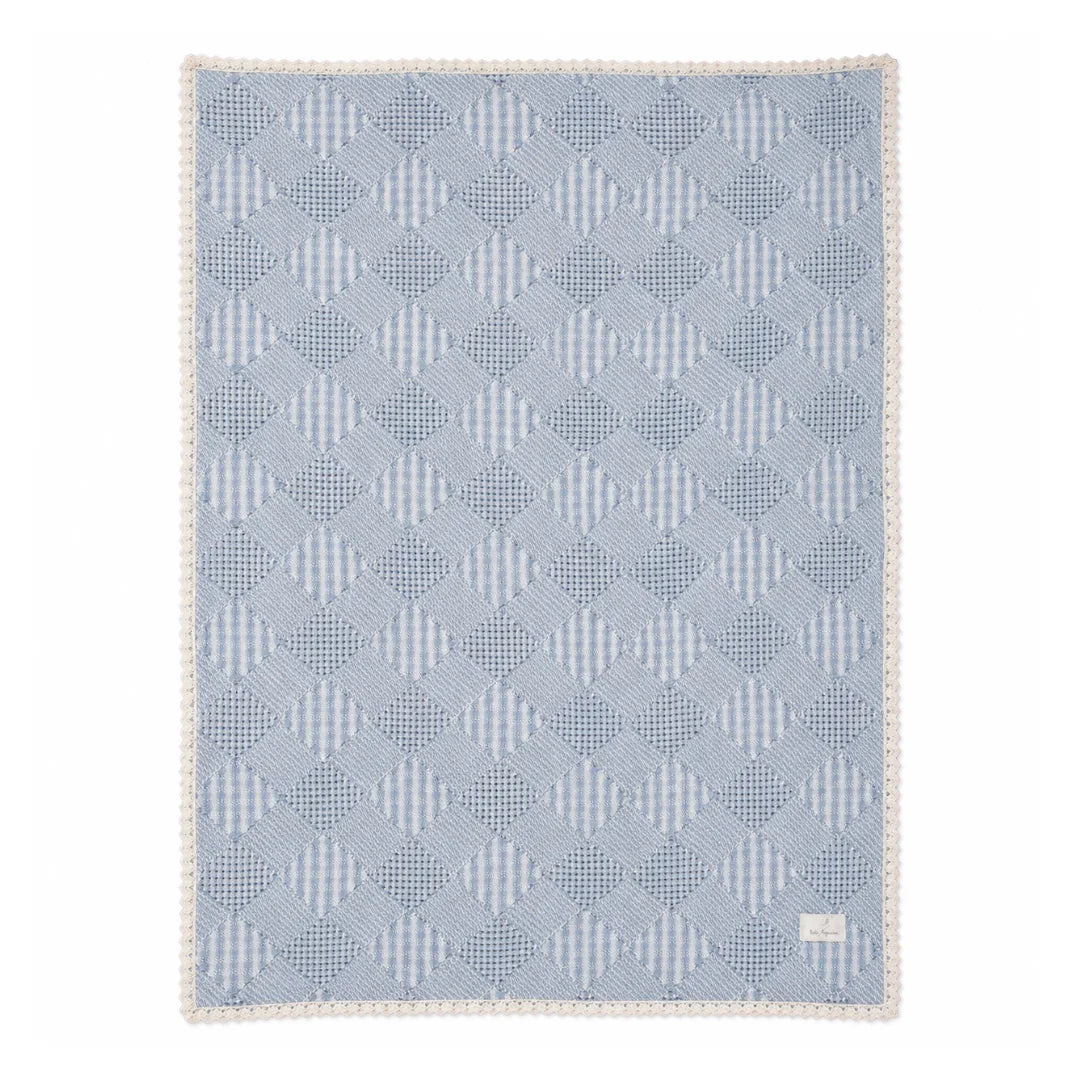 A front view of the Bebe Organic blue plaid patchwork organic cotton baby blanket.
