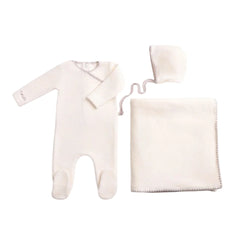 A front view of the luxurious chalk white Bee & Dee velour footie and bonnet full set