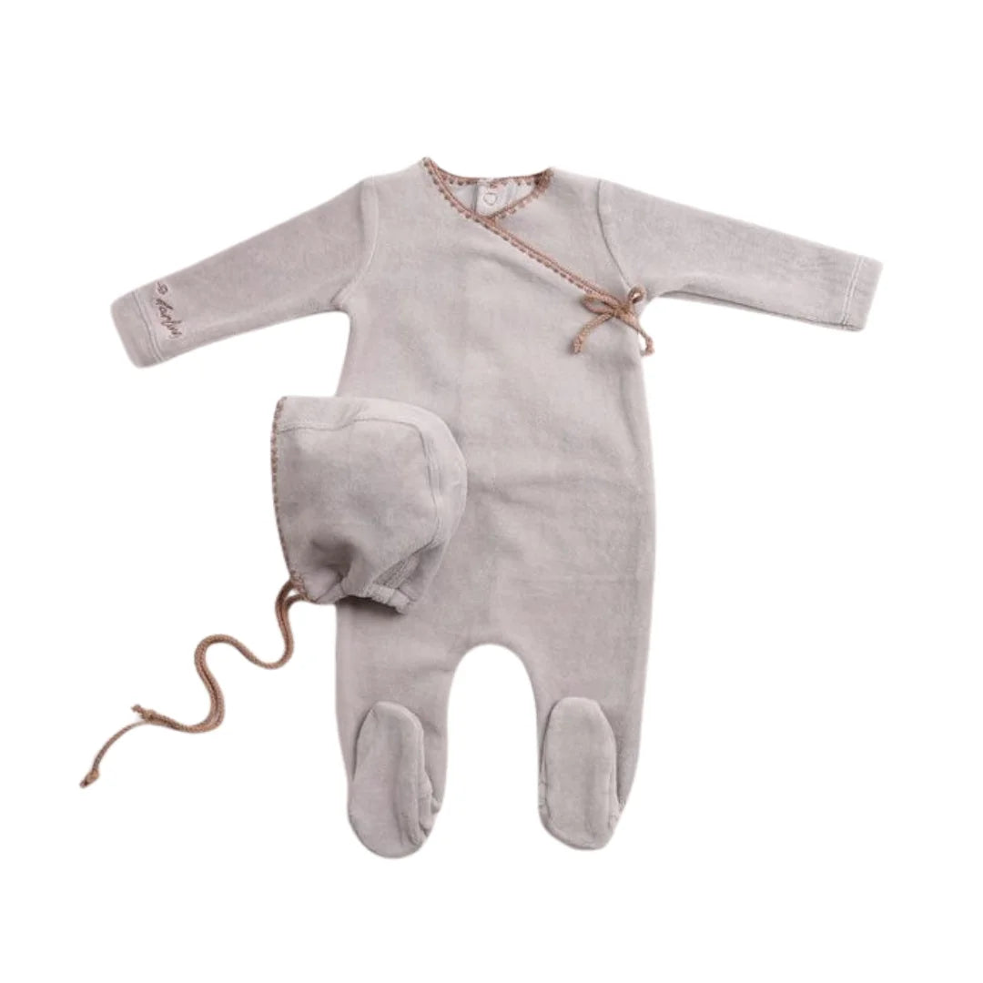 A front view of the luxurious dusty blue Bee & Dee velour footie and bonnet set.