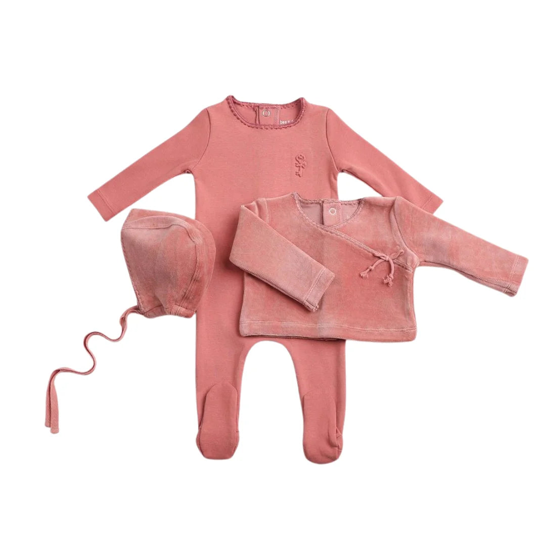 A front view of the elegant dusty pink Bee & Dee wrap set.