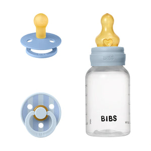 BIBS baby bottle and pacifiers with blue and yellow design on a white background