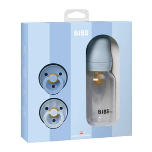 BIBS baby bottle and pacifiers set in packaging on a white background