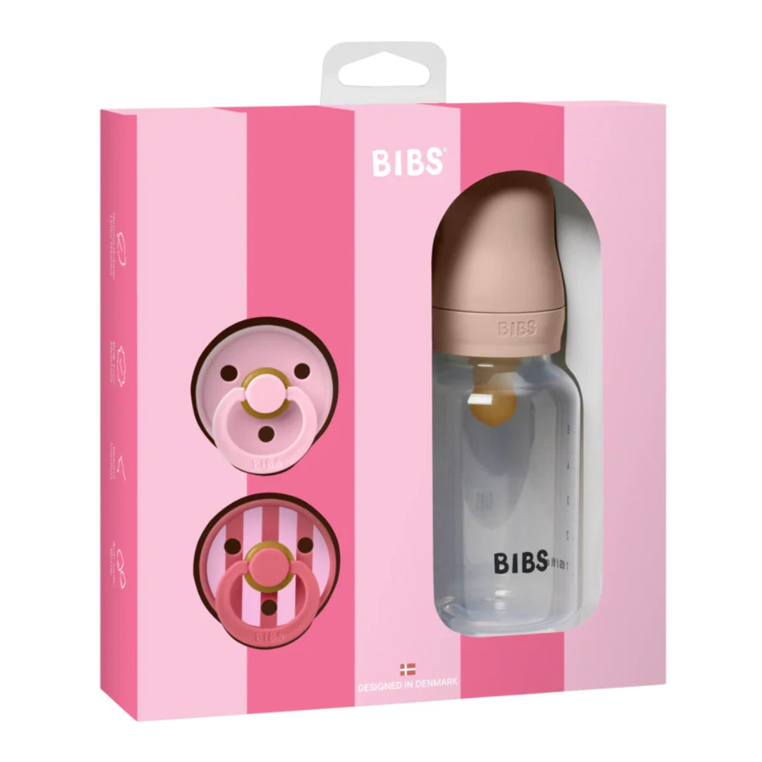 BIBS baby bottle and pacifiers set in packaging with pink and white striped design