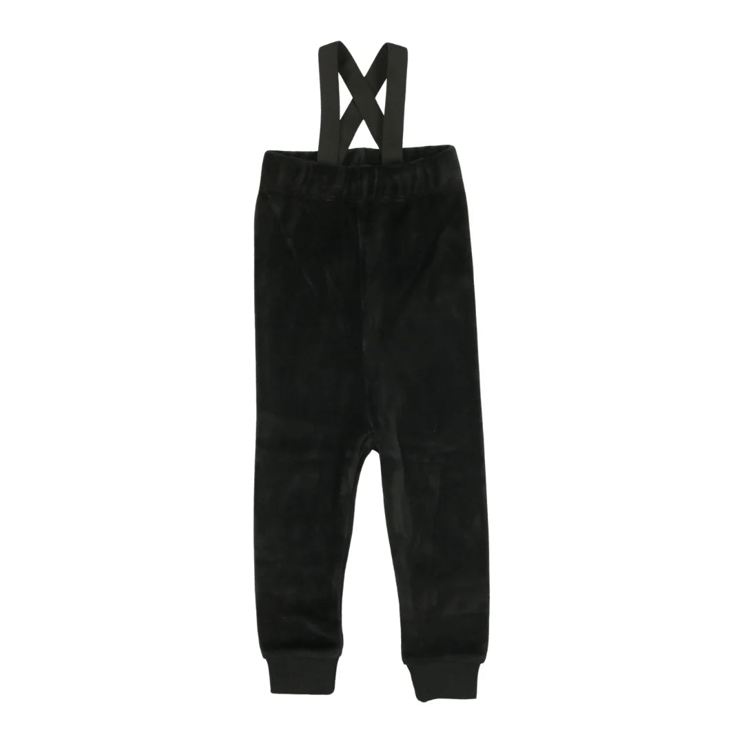 A front view of the Bopop black velour overalls for boys.