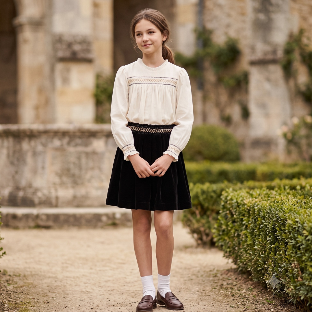 Girl wearing the C'era Una Volta ensemble for a classic, sophisticated boutique look.