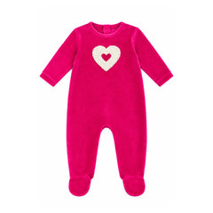 A flat-lay view of the Coton Pompom embrace heart footie in fuchsia and ivory.
