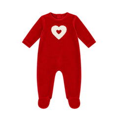 A flat-lay view of the Coton Pompom embrace heart footie in red.