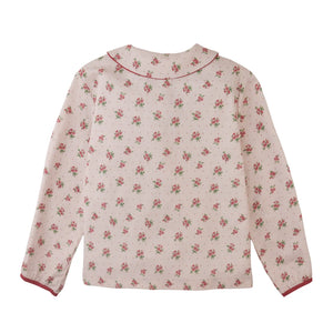 The back view of the floral Caridad blouse by Gingersnaps, showing the comfortable fit.