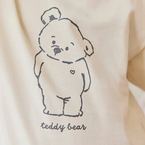 teddy bear print on shirt close up