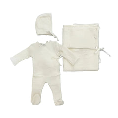 A complete flatlay of the Latte Baby 4-piece embossed knit wrap, bonnet, and blanket set in white.