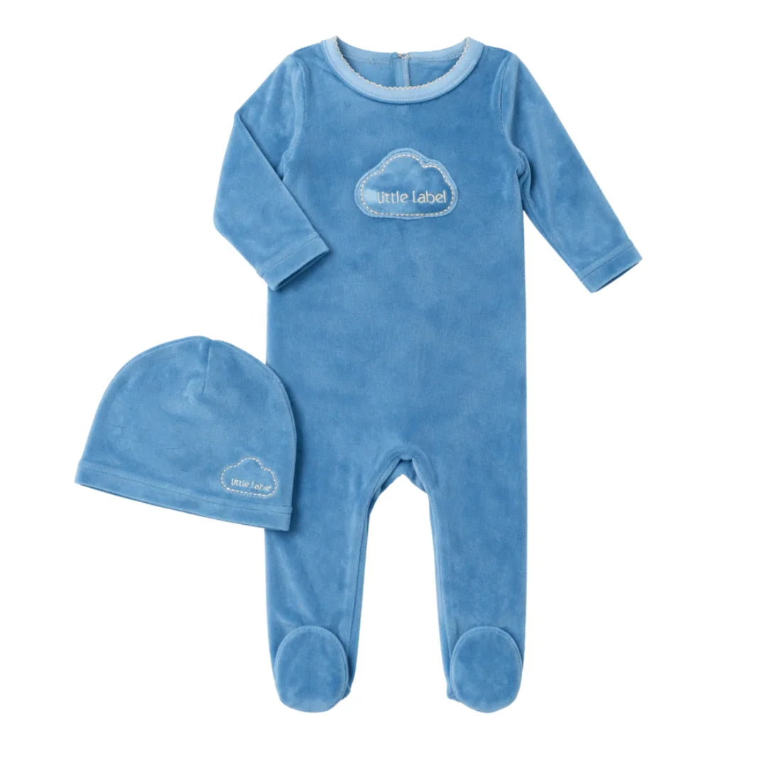 A front view of the Little Label blue velour baby footie and matching hat with cloud detail.