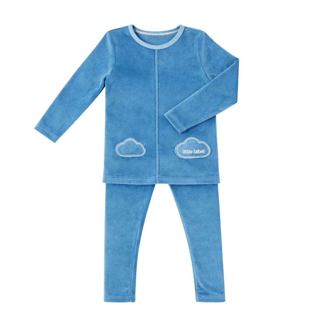 A front view of the Little Label blue velour pajama set with cloud pocket.