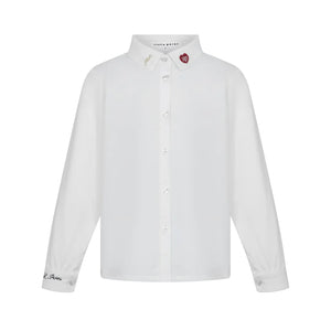 A front view of the Little Parni girl's elegant embroidered shirt in white.
