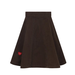 front view of the Little Parni brown denim heart detail skirt.