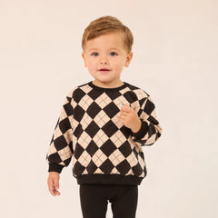 A front view of the Little Parni toddler black argyle designer sweatshirt set.