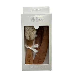 A front view of the Little Threads wooden baby hairbrush and comb set.