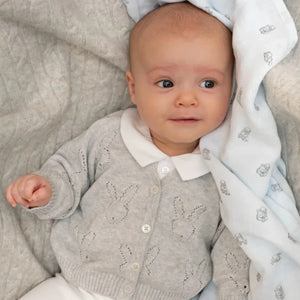 A little one wearing the grey Livly bunny cardigan for a classic, sophisticated boutique look.