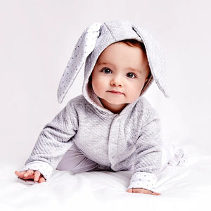 A toddler wearing the Livly Bunny Cardigan, looking stylish and comfortable.