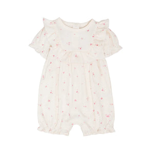 A front view of the elegant Livly Rose Garden Edith Jumpsuit in Ivory.
