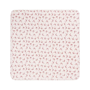 A flat-lay view of the MarMar Copenhagen Alida bows blanket in pink.