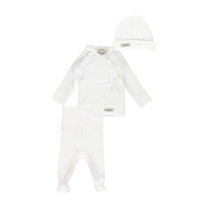 A flat-lay view of the MarMar Copenhagen gentle white tut wrap and hat set.