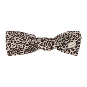 A front view of the MarMar Copenhagen dark brown leo animal print kids headband.