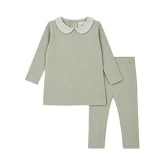 A front view of the Mema Knits mint two-piece set with printed collar.