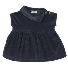 A breathtaking 1+ in the Family Aosta Knit Dress in Blue, showcasing its authoritative architectural fit and refined Spanish knit texture.