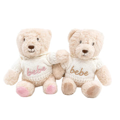 A soft, cuddly Picky Teddy bear wearing a cozy knit hooded sweater.