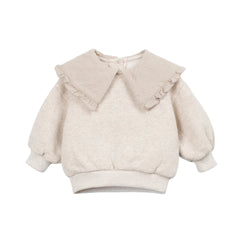 A front view of the Play Up knit sweater with contrast collar in beige.