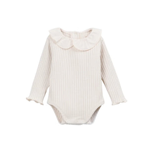 A front view of the Play Up ribbed body in beige.