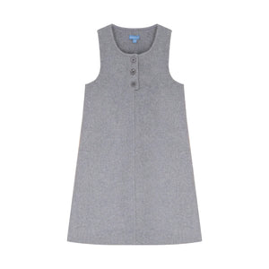 A high-resolution close-up highlighting the intricate placket buttons and fine wool knit texture.