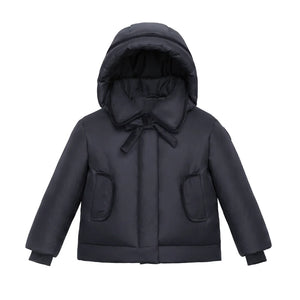 A front view of the Pramie black jacket with a tied bow for girls.