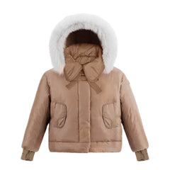 A front view of the Pramie camel jacket with a tied bow for girls.