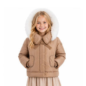 A front view of the Pramie girls jacket with tied bow in camel.