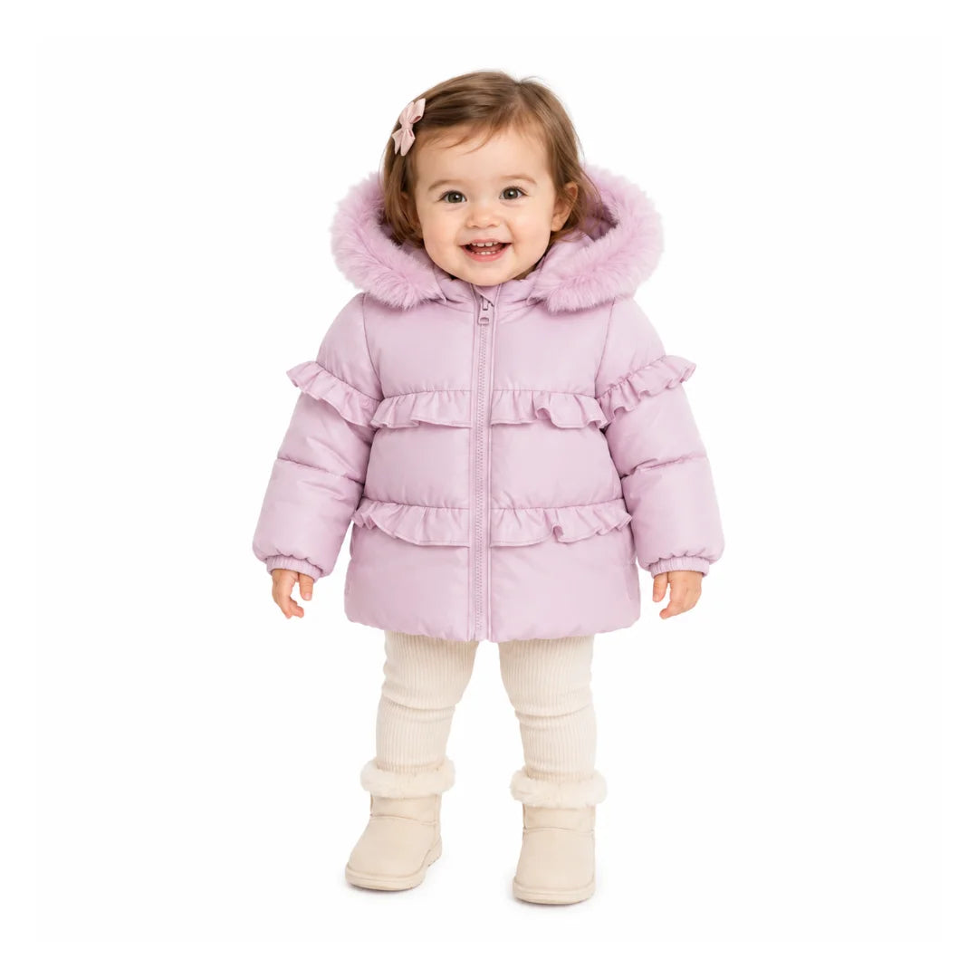 An infant styled in the Pramie lavender ruffle coat during an outdoor autumn outing.